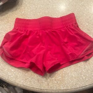 Athletic shorts. Size small. Color bright pink